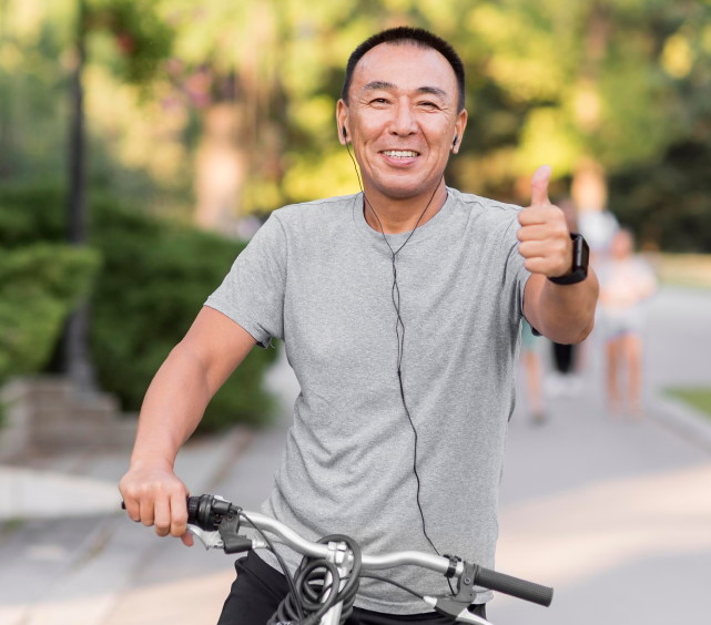 medium shot man with bicycle